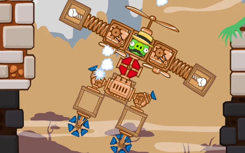 Schermata di Bad Piggies: una macchina volante assemblata con casse, molle ed eliche.